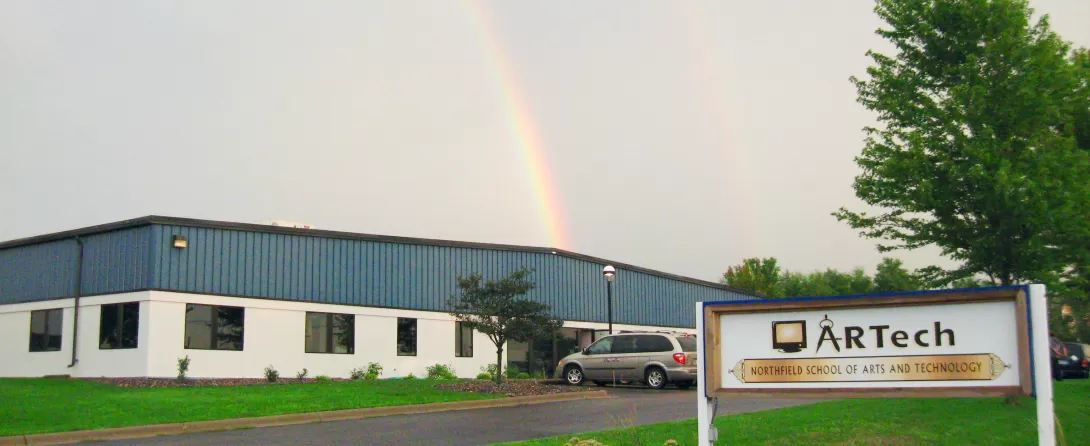 Rainbow over the school building
